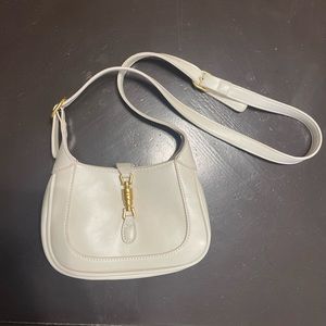 White hand bag